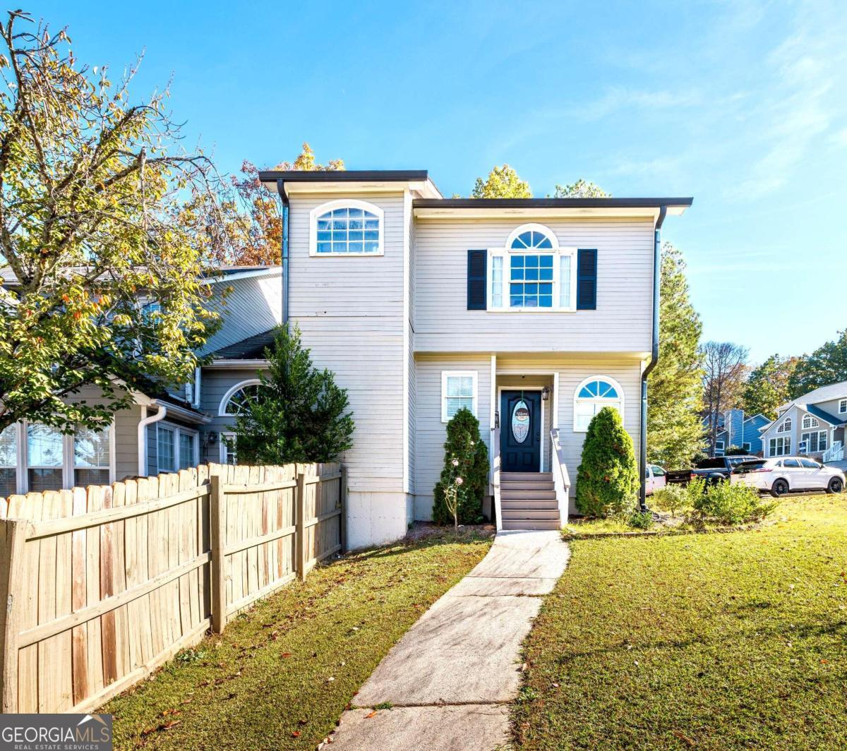 a front view of house with yard