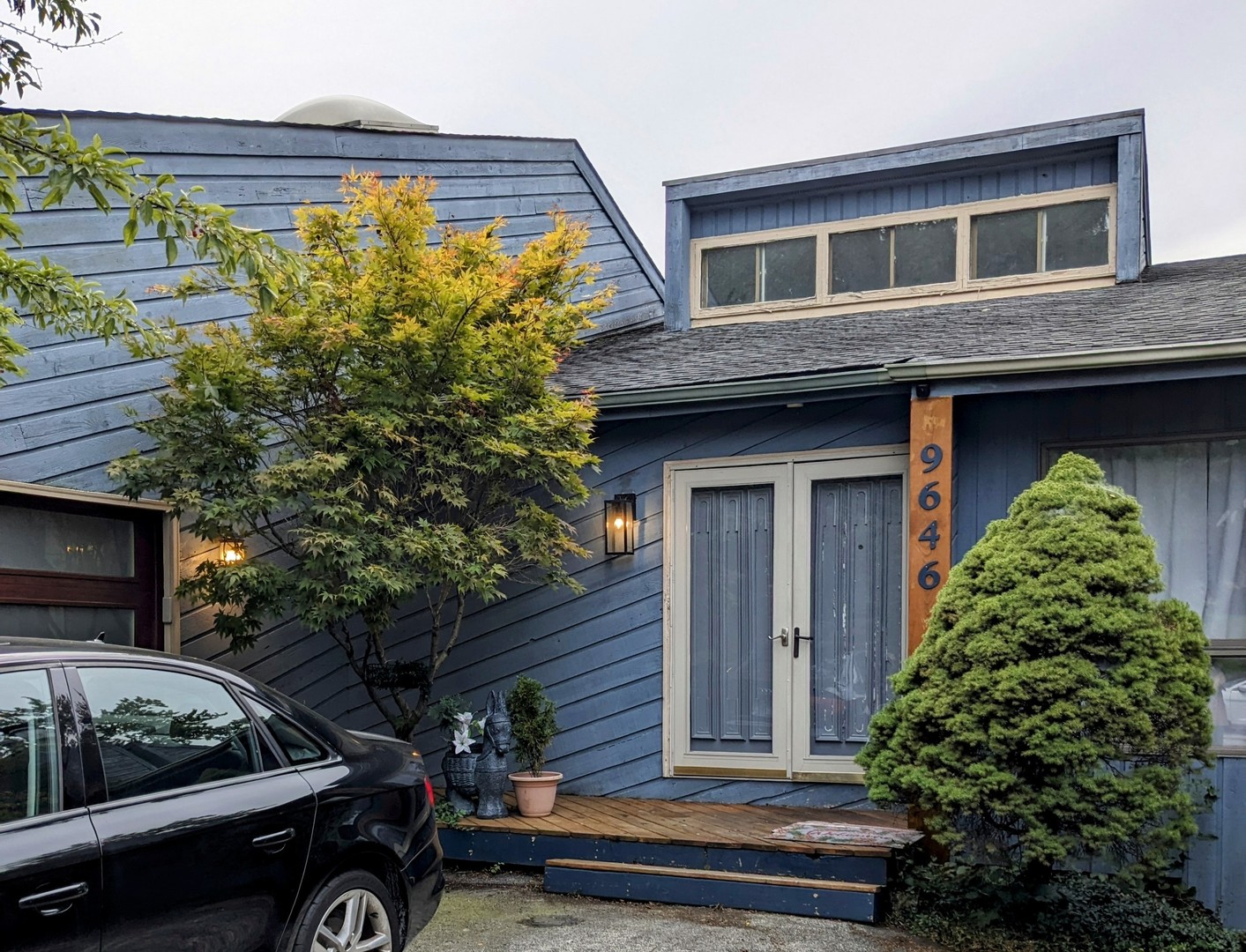 a view of a house with a door and a window