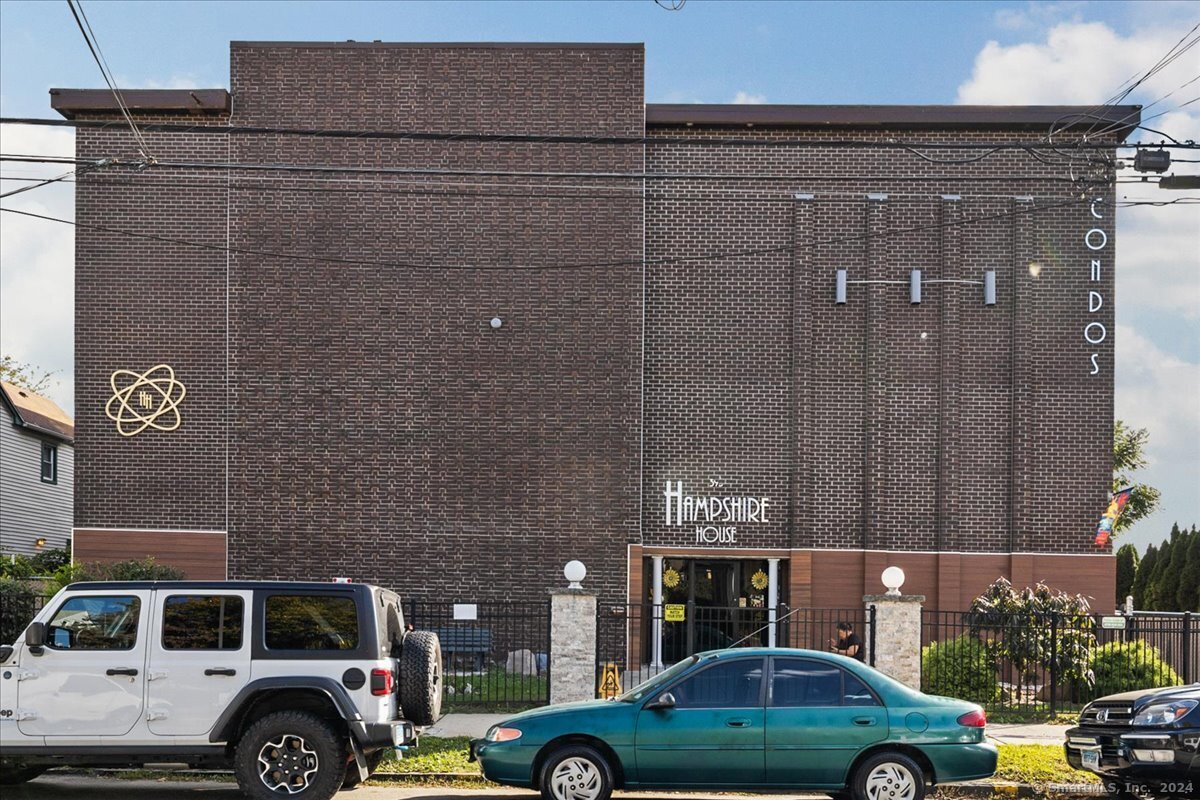 a car parked in front of a building