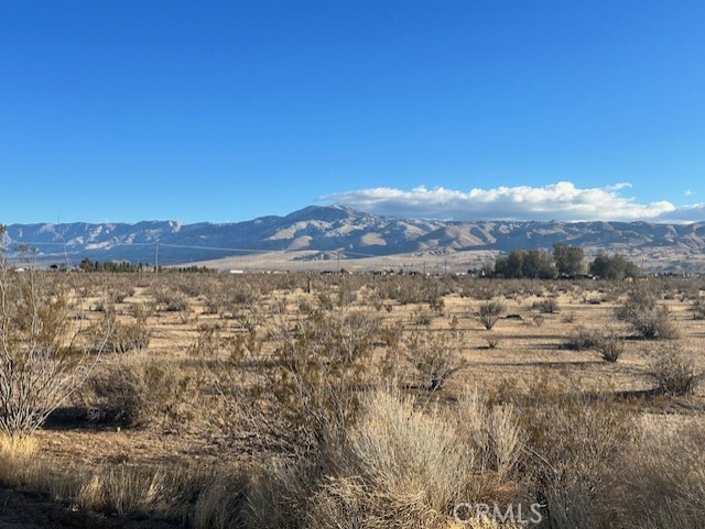 a view of ocean and mountain