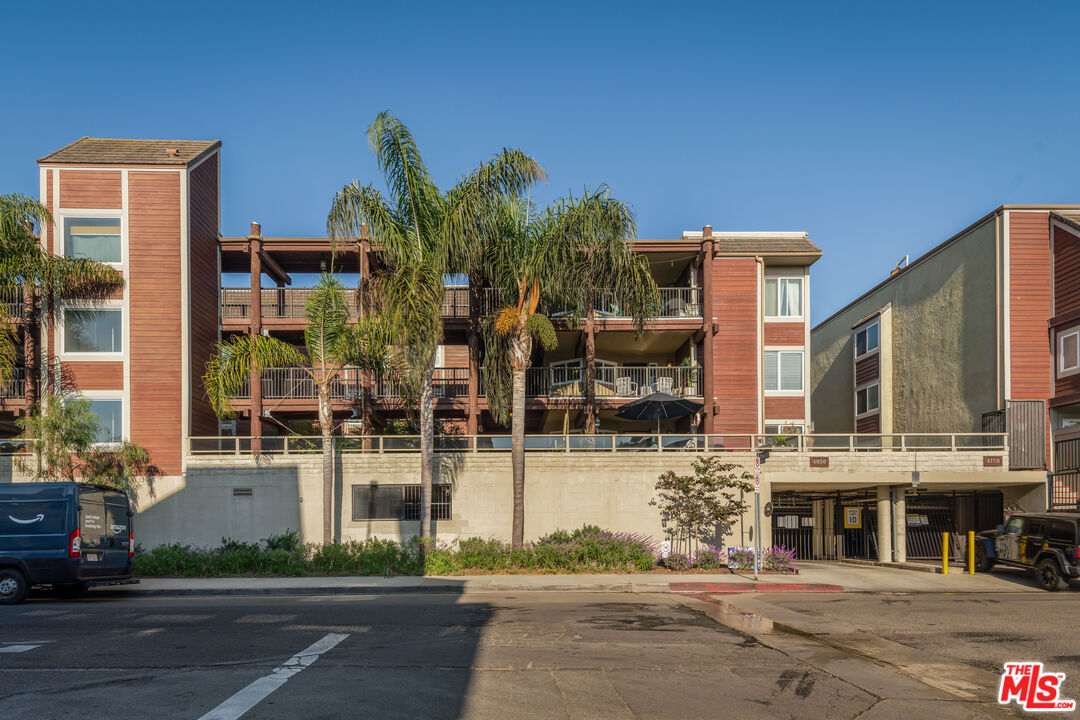 a front view of a building with street view