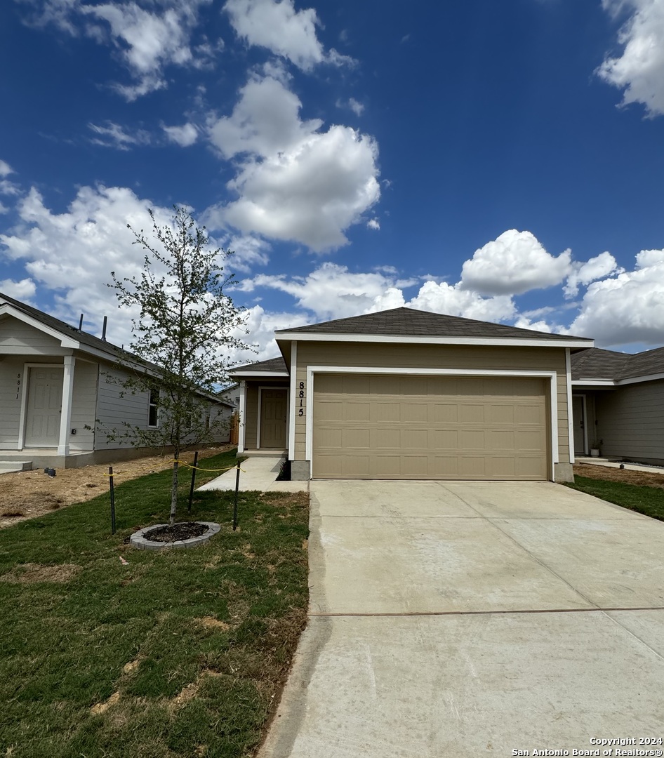 front view of house with a yard