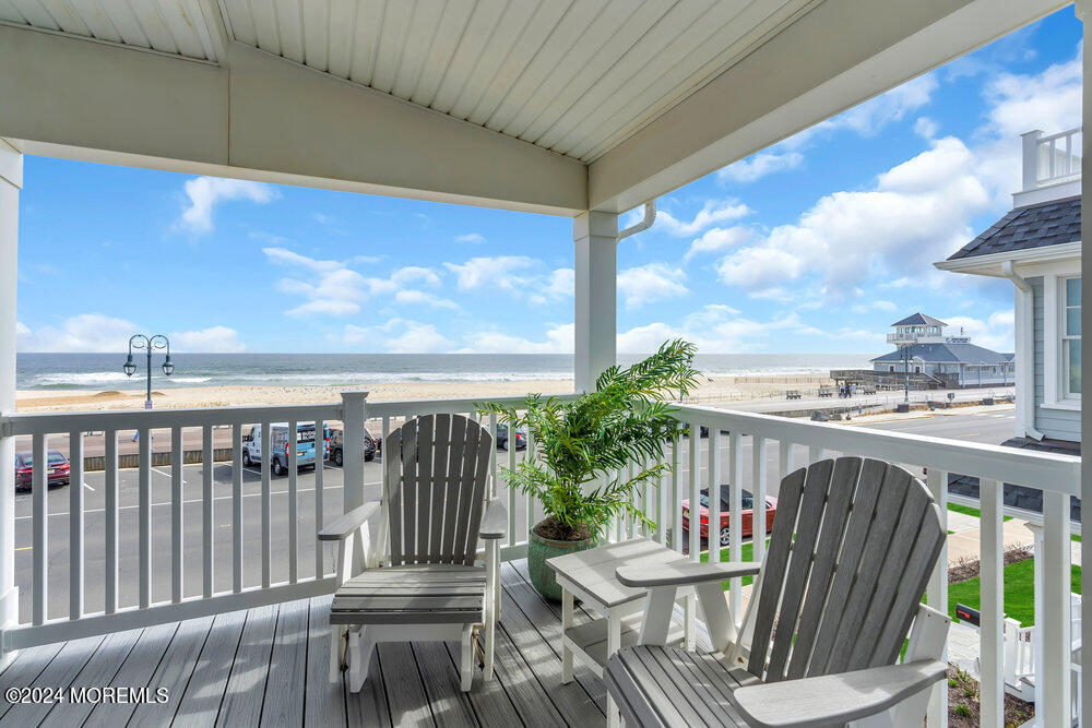 a view of a balcony with chairs