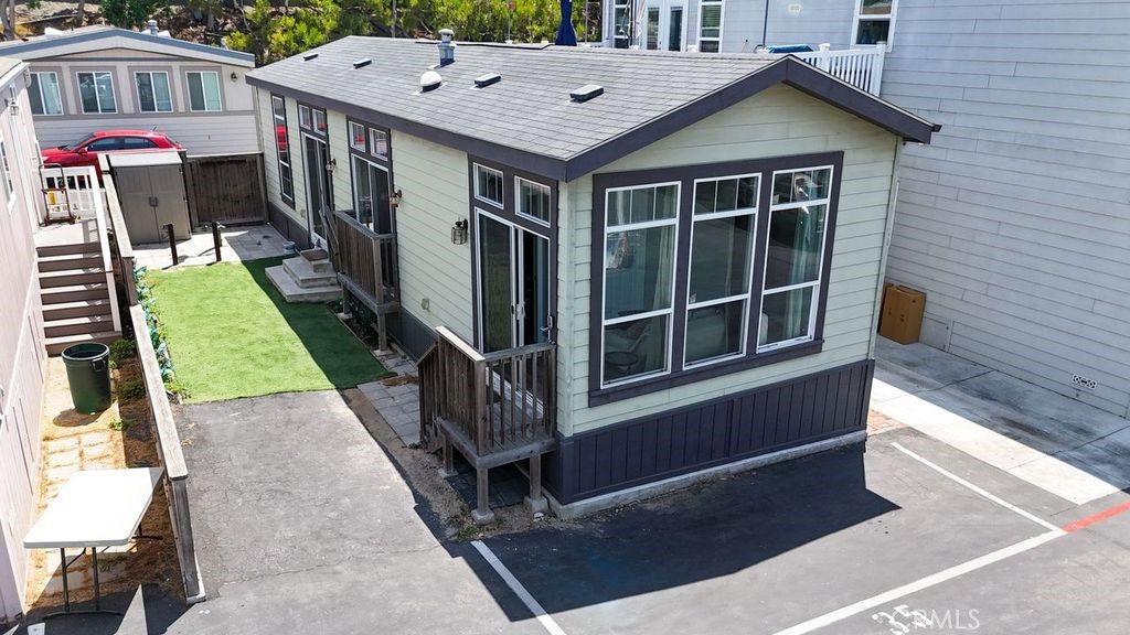 a aerial view of a house with a yard