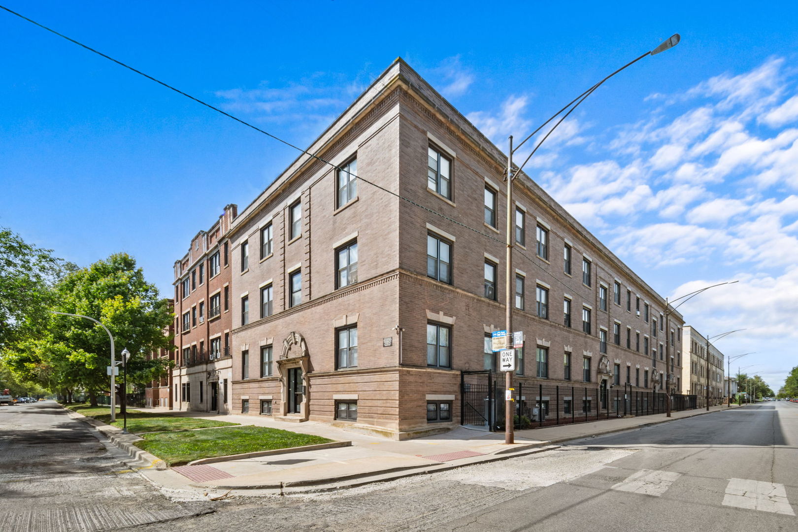 a front view of a building with street view