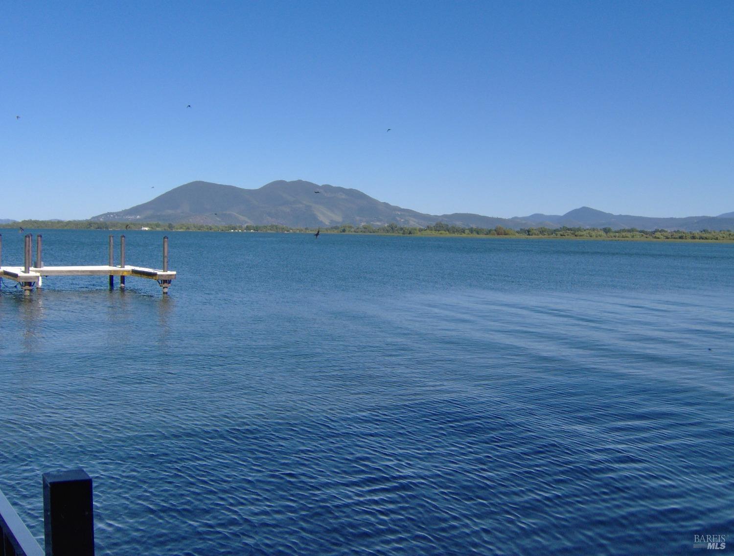 a view of lake with mountain