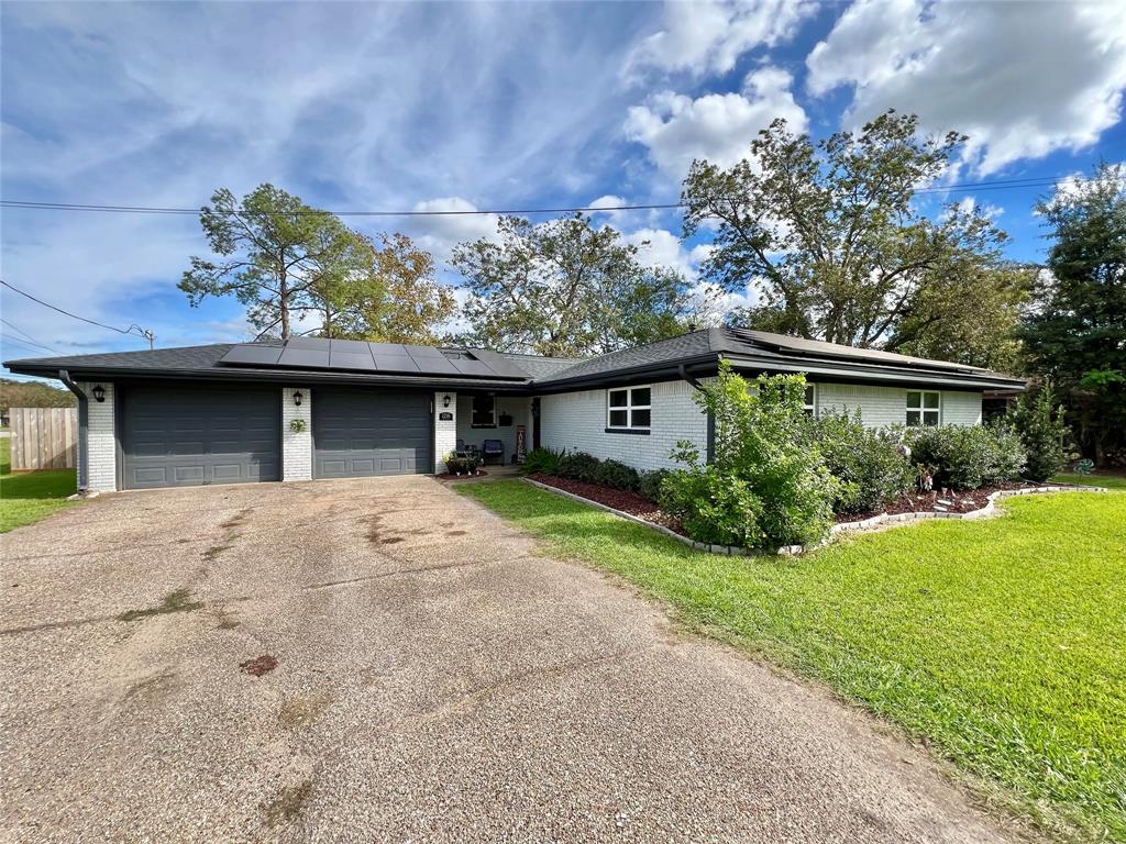 front view of house with a yard