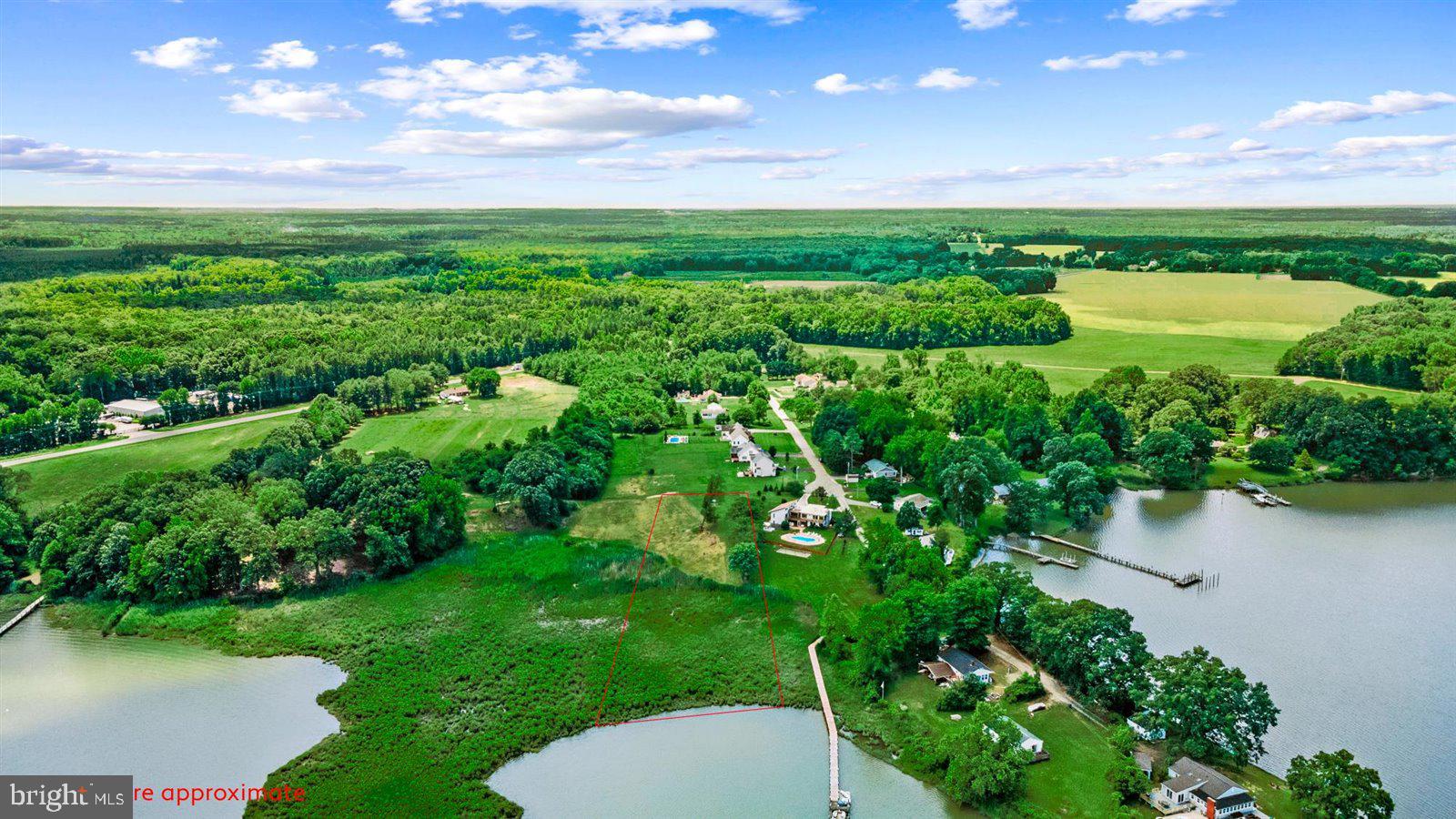 a view of a lake with a yard