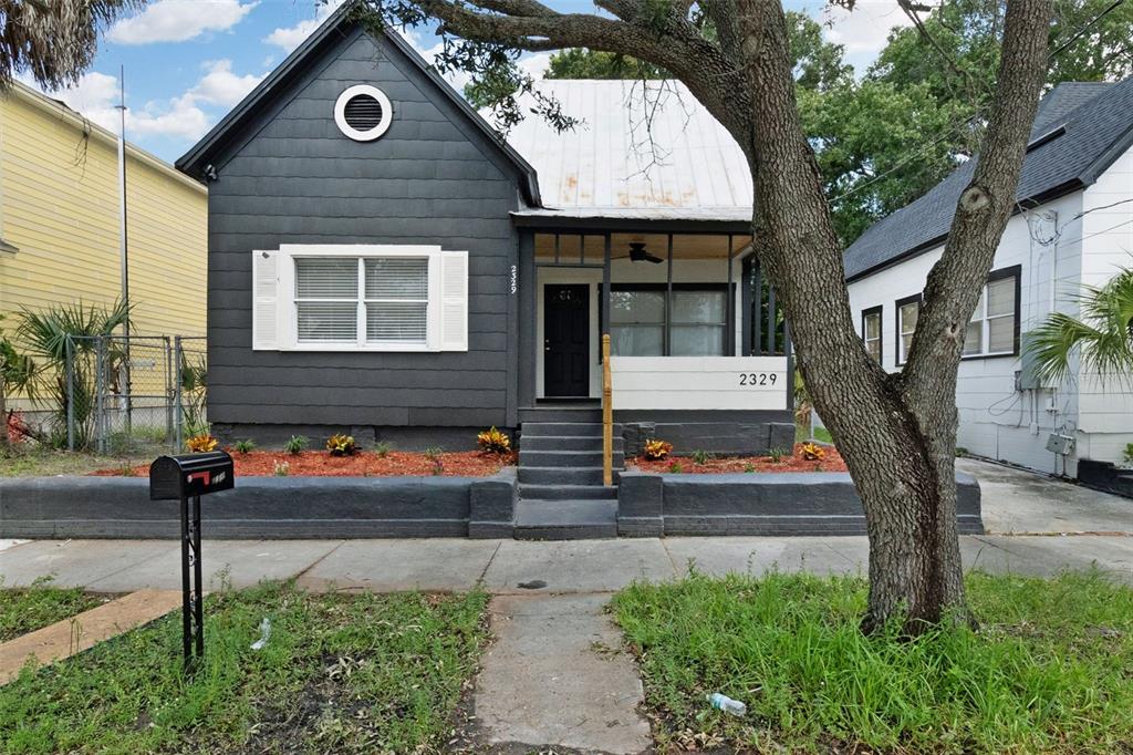 a front view of a house with street