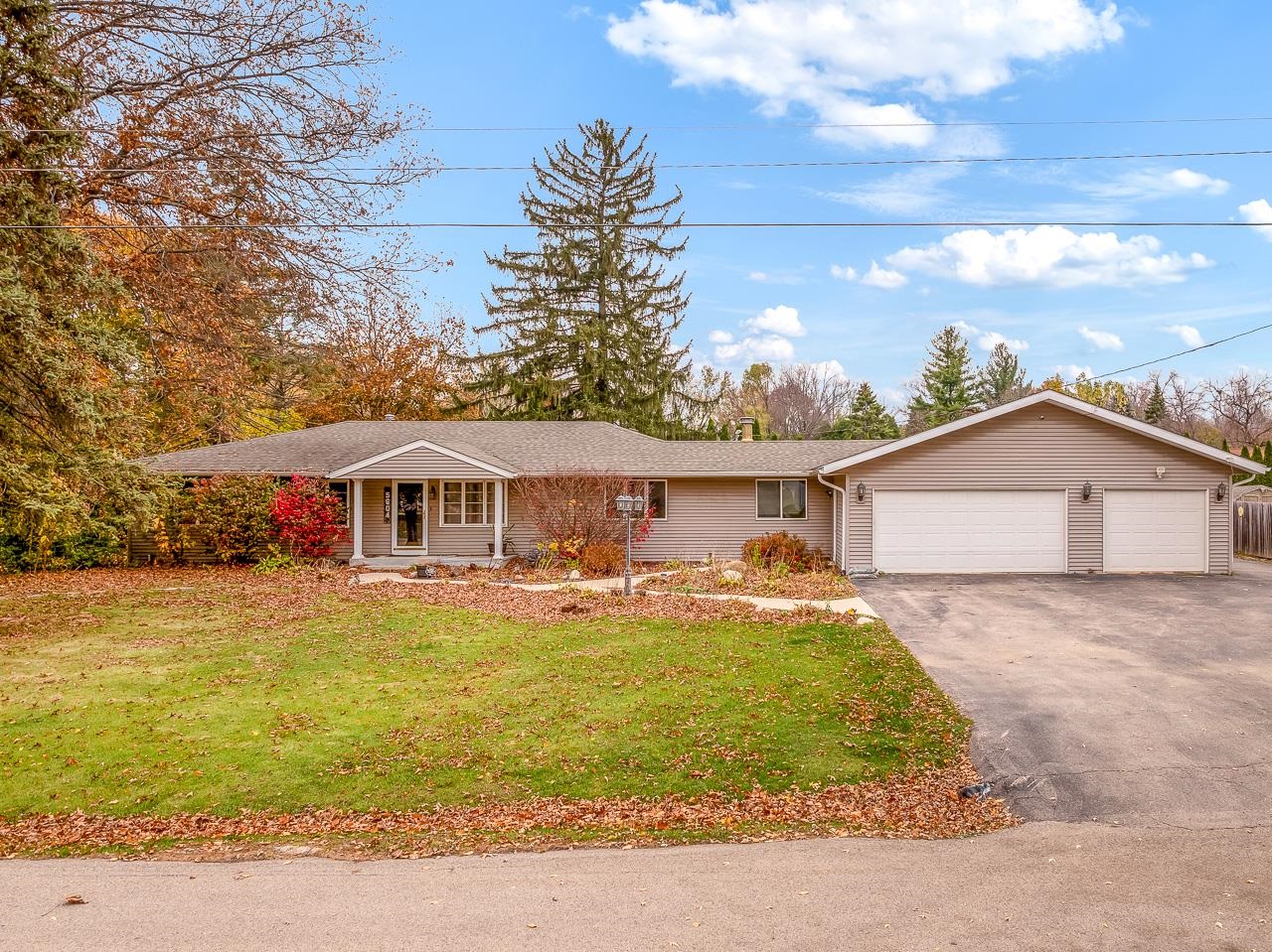 front view of a house with a yard