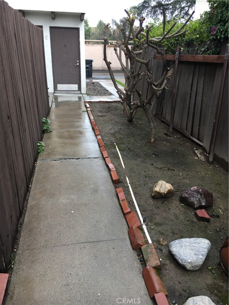 a backyard of a house with seating space