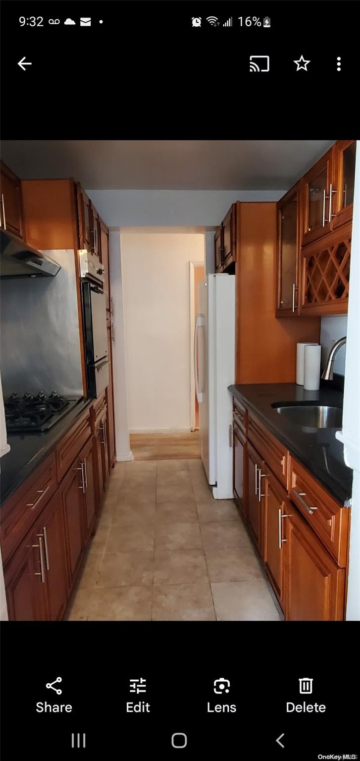 a kitchen with granite countertop lots of counter top space