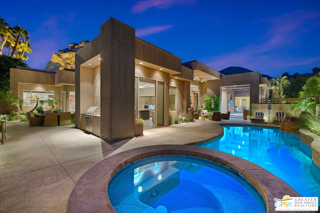 a view of a house with swimming pool