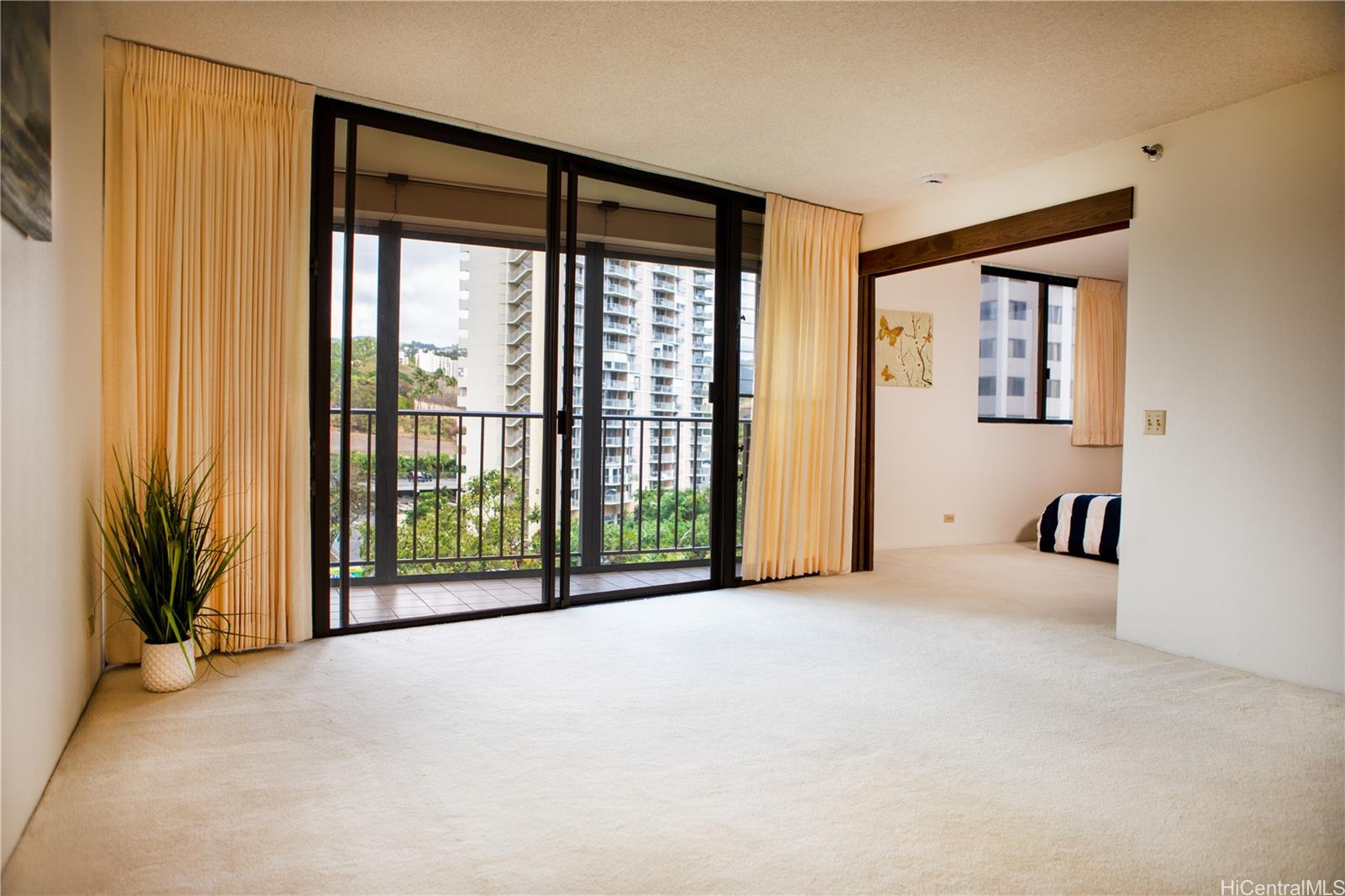 a view of an empty room with a window