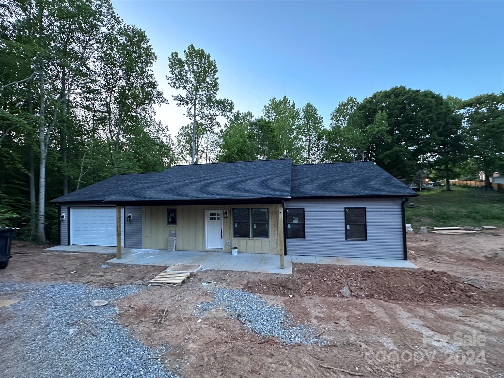 a house with trees in the background