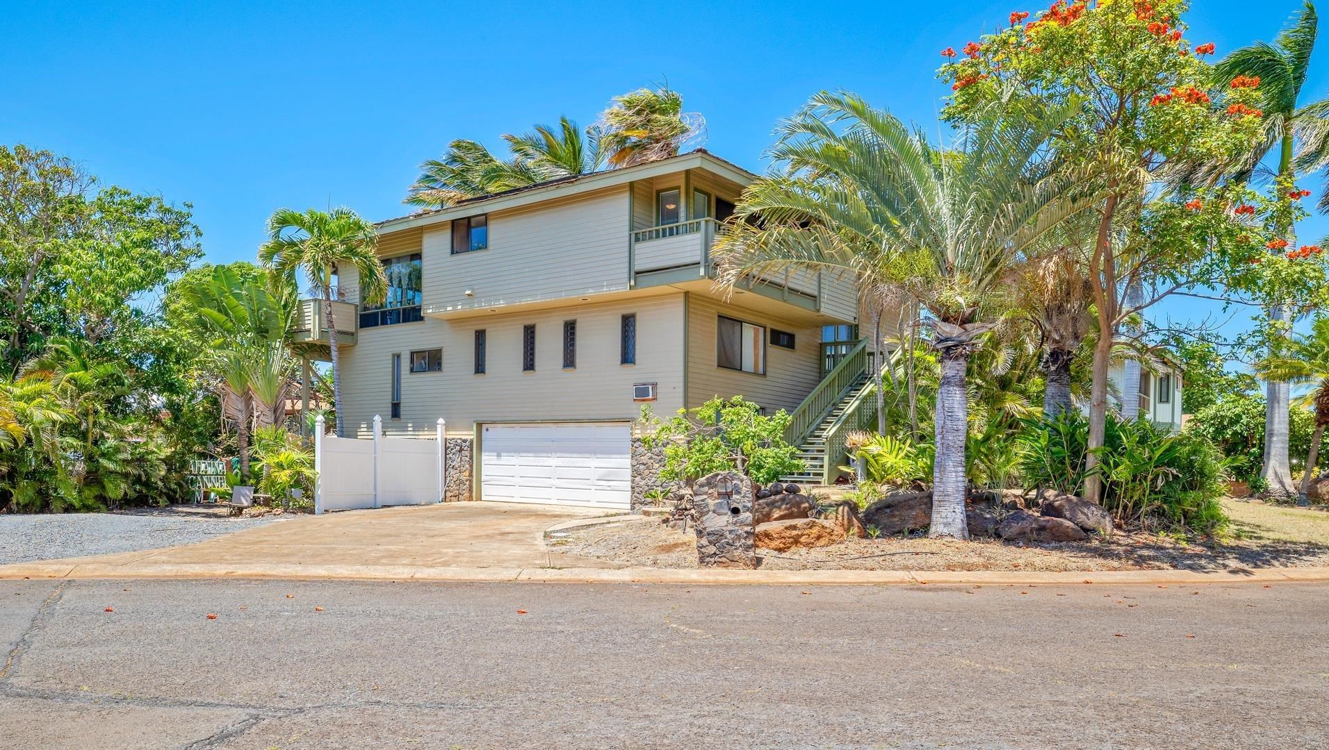 front view of a house with a street