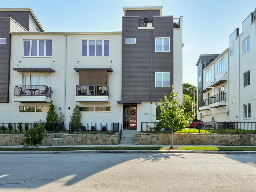 a front view of a multi story residential apartment building