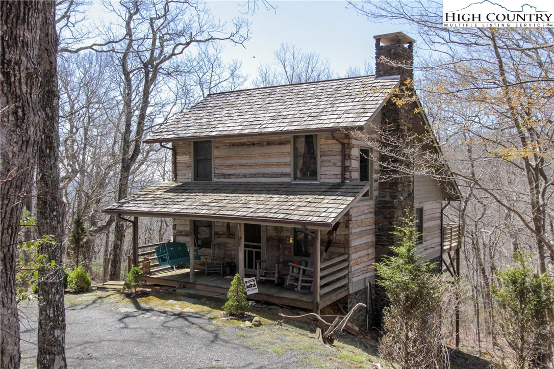 a view of house with outdoor space