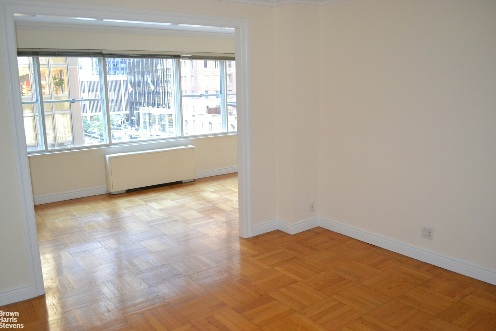 a view of an empty room with a window