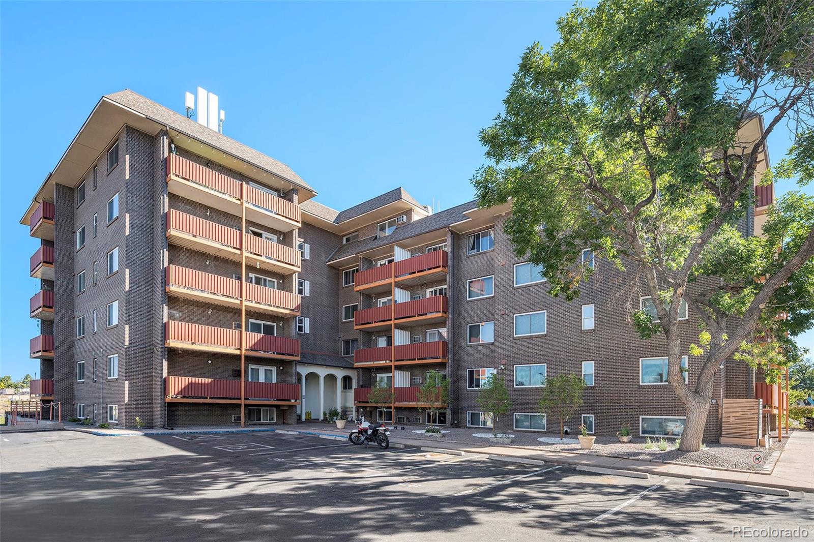 a front view of a building with street view