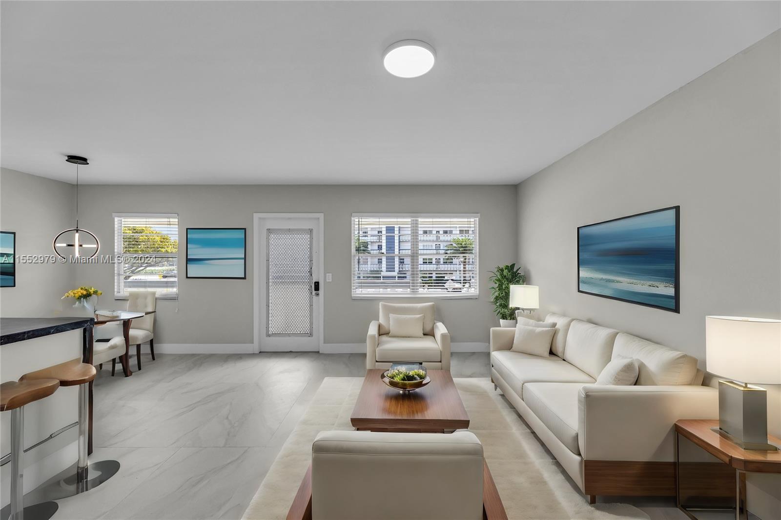 a living room with furniture and a window