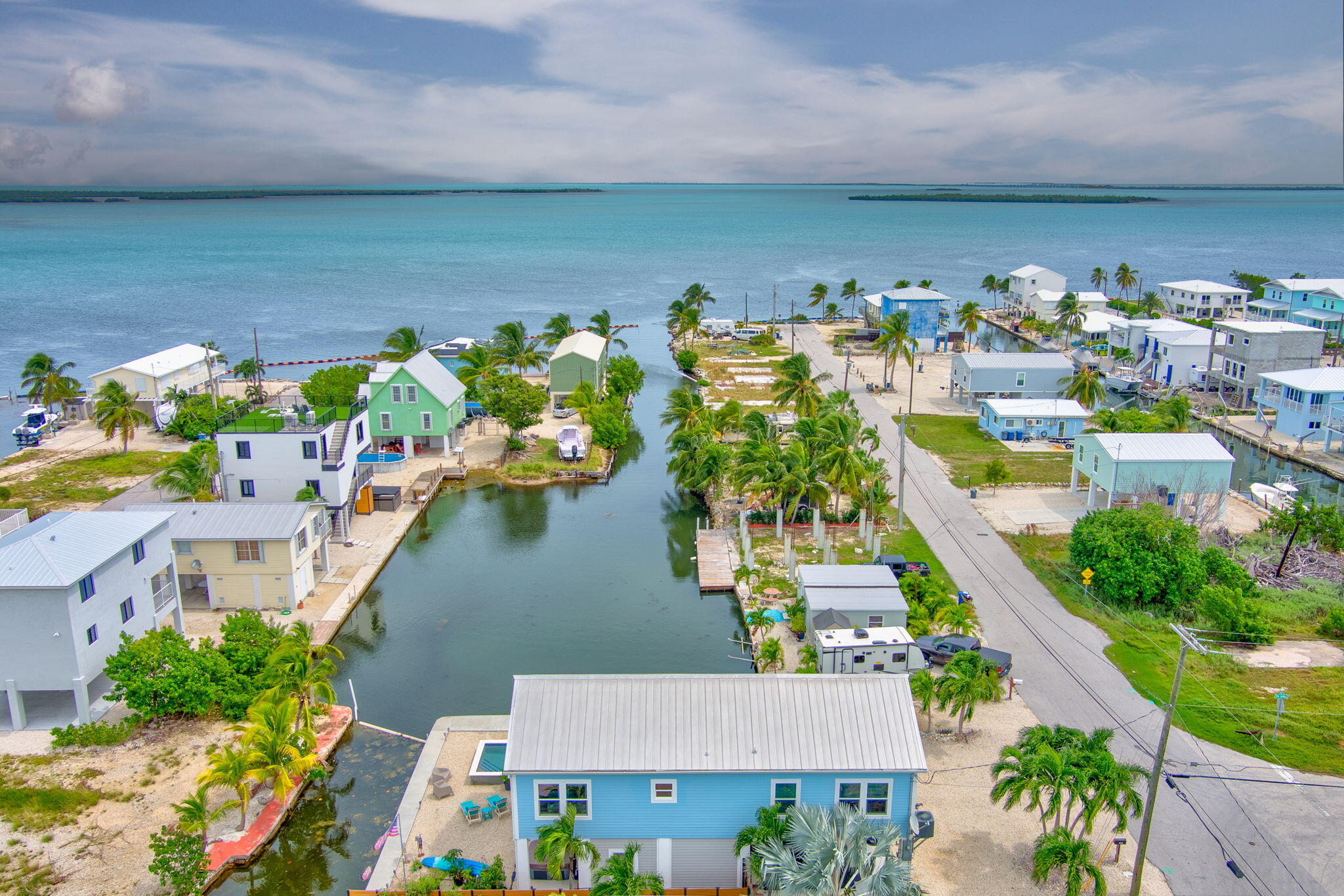 an aerial view of a house with a lake view