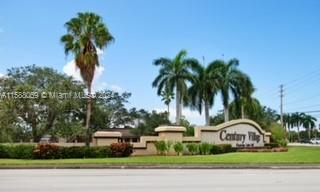 a view of a palm trees in front of a house