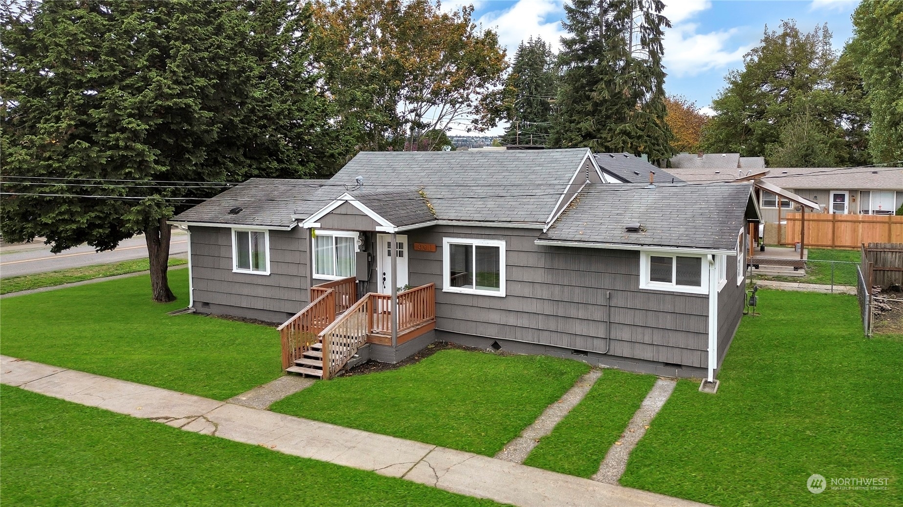 a aerial view of a house with a yard