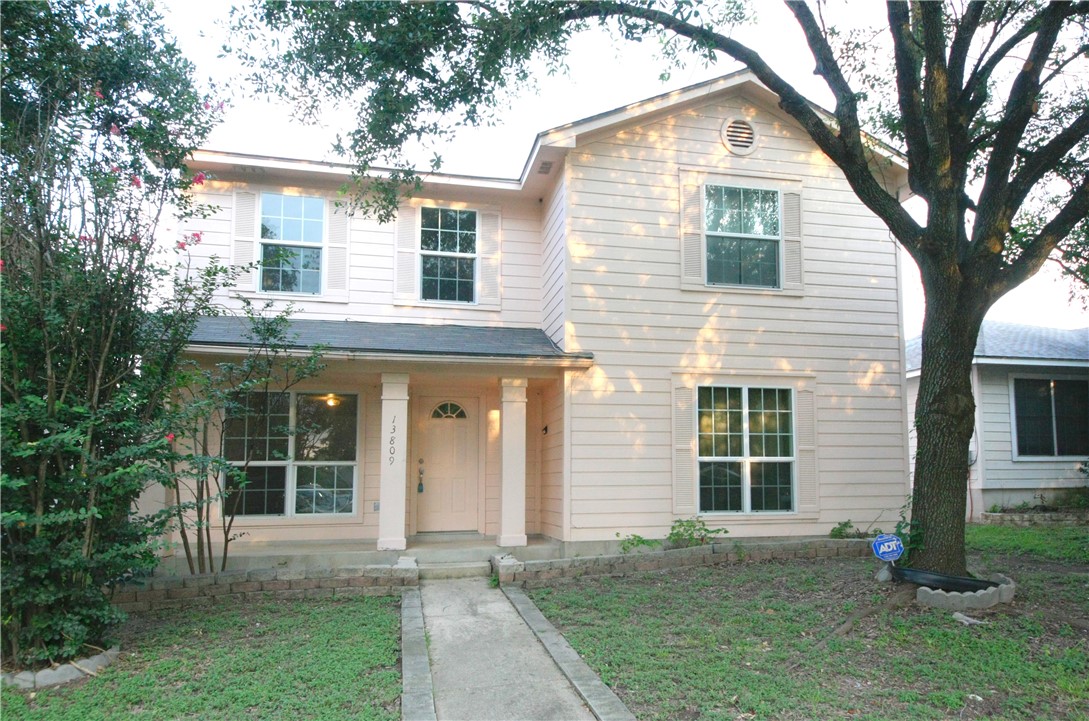 a view of outdoor space yard and front view of a house