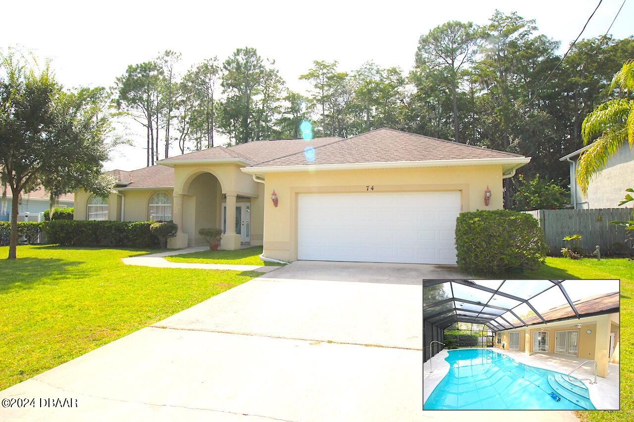 a front view of a house with yard