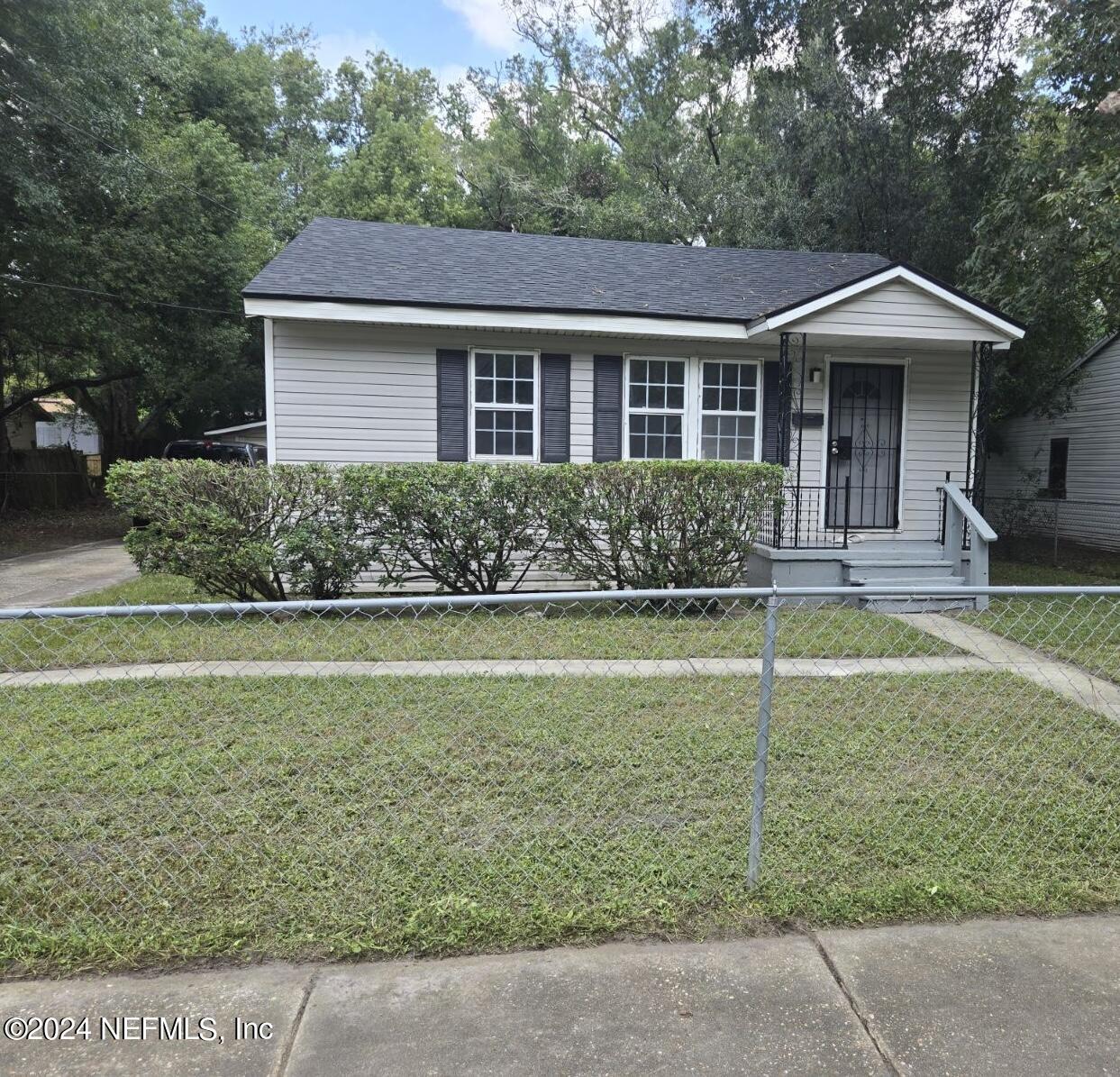 a front view of a house with swimming pool