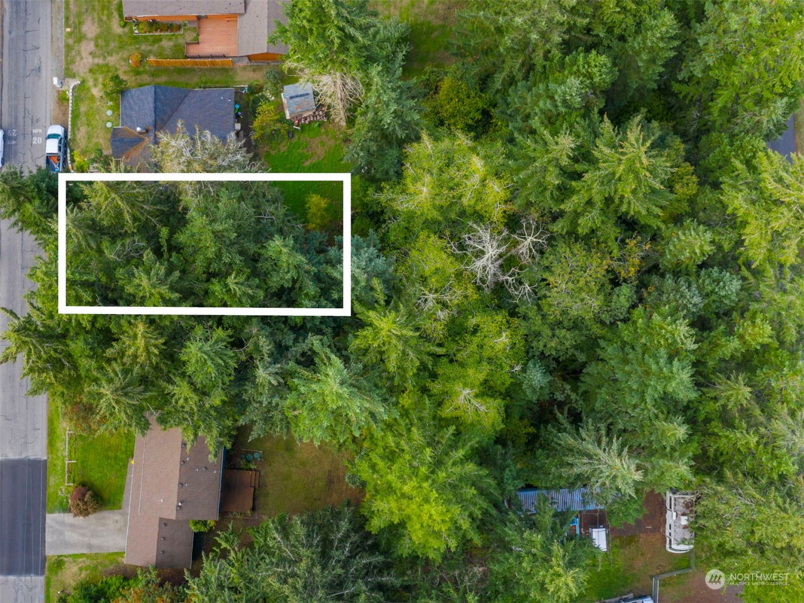 a view of a house with a small yard