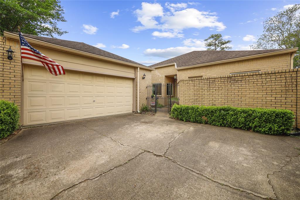 a front view of a house with a garage