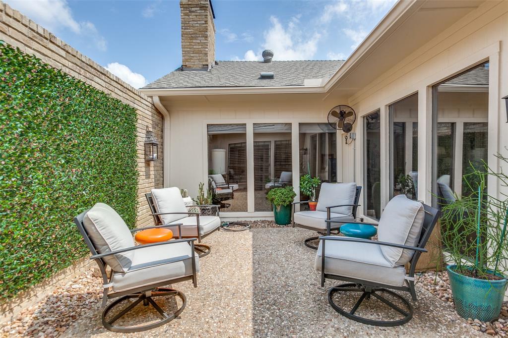 a outdoor space with patio the couches and a potted plant with outer view