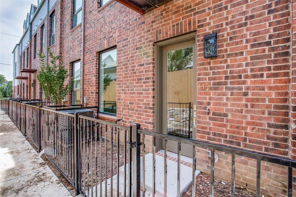 a view of a brick wall from a balcony