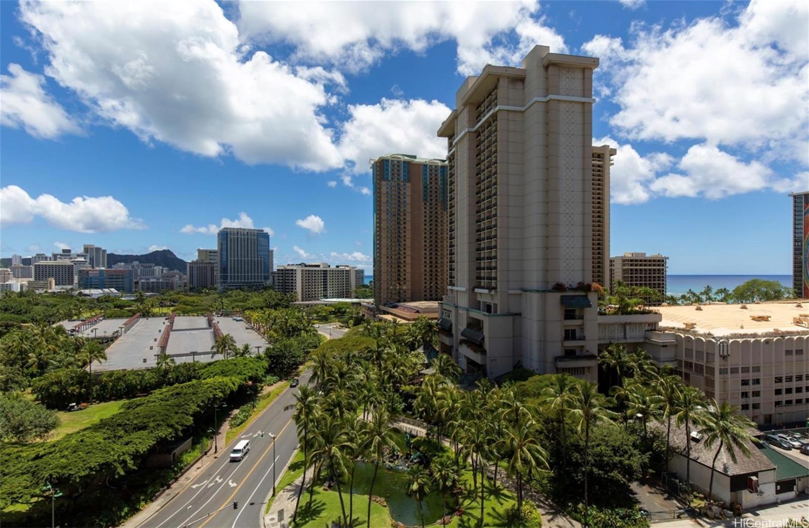 a view of a city with tall buildings