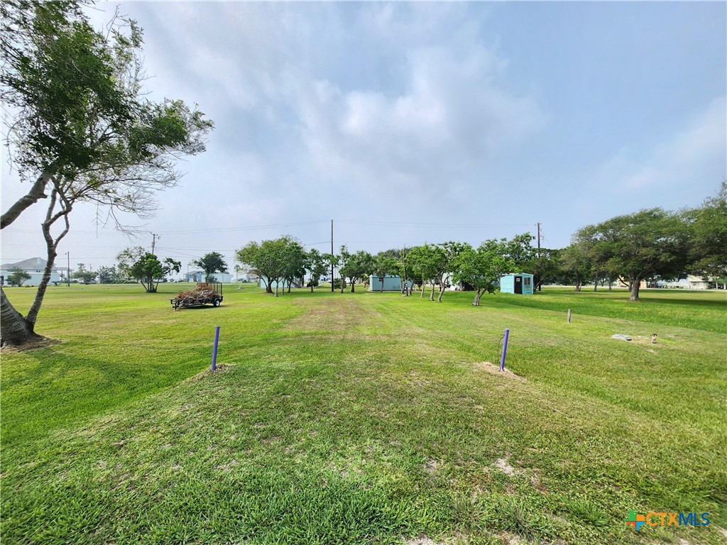 a view of a golf course with a lake