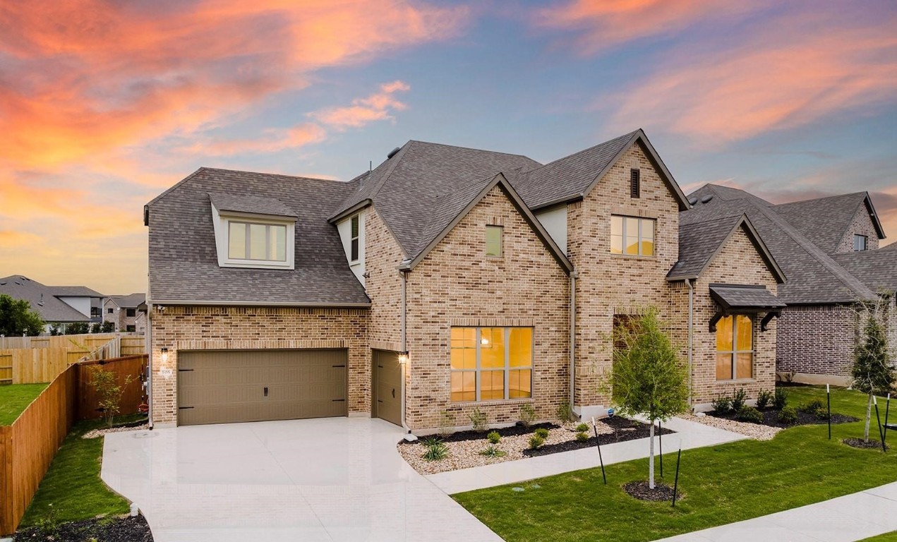 exquisite driveway with side-swing garage entrance