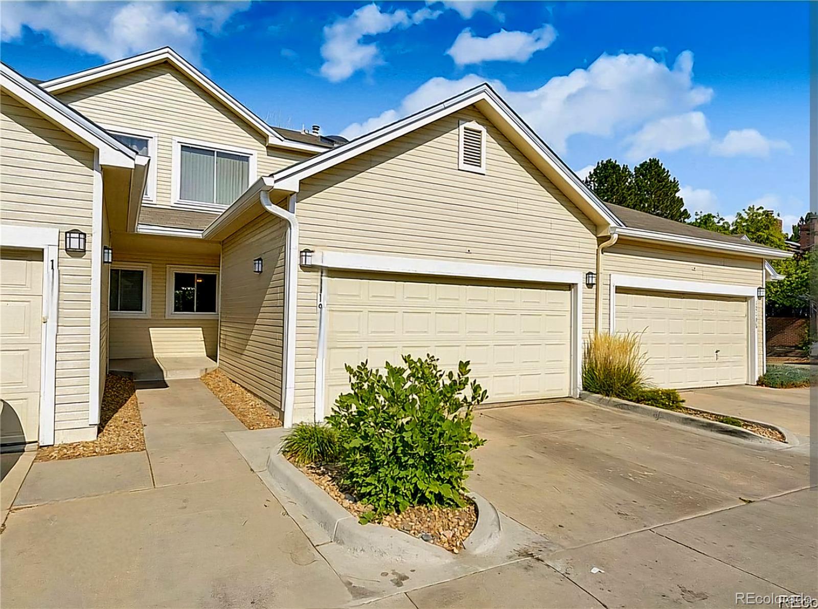 a view of a house with a garage