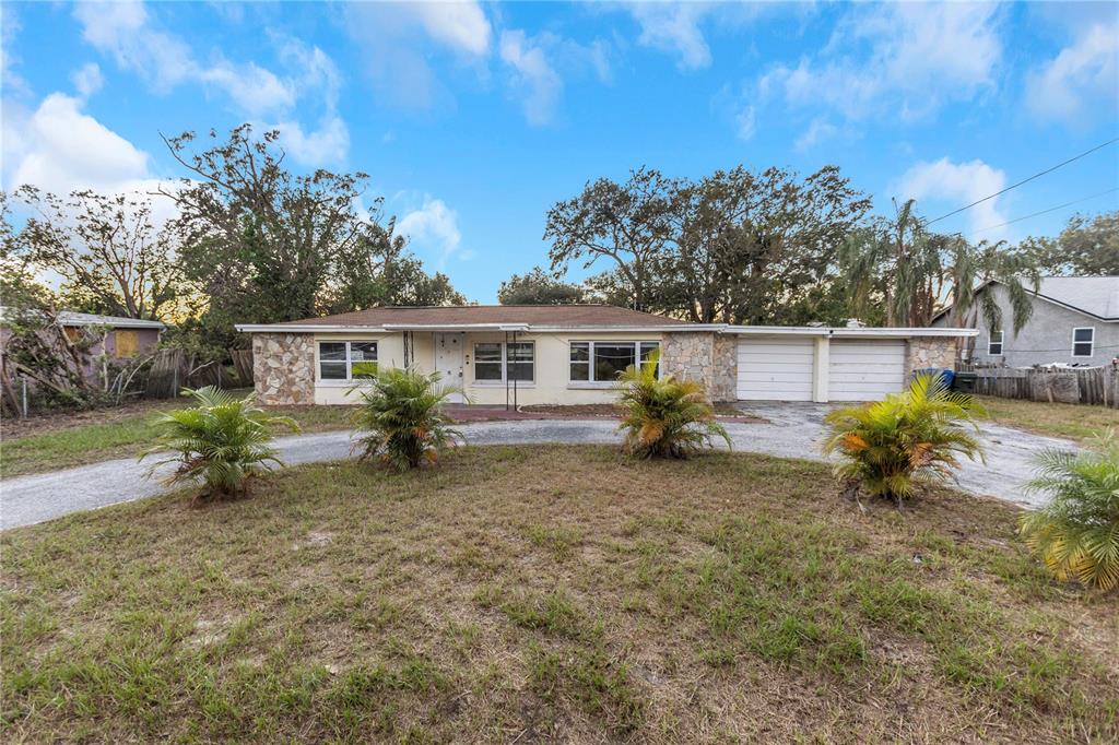 front view of a house with a yard