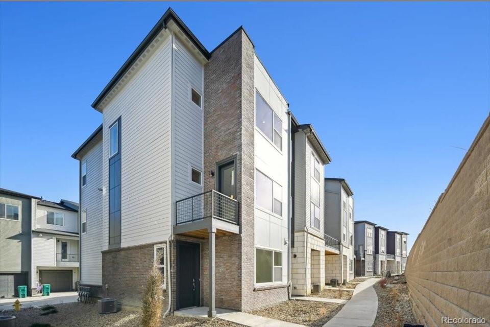 a front view of a building with a street