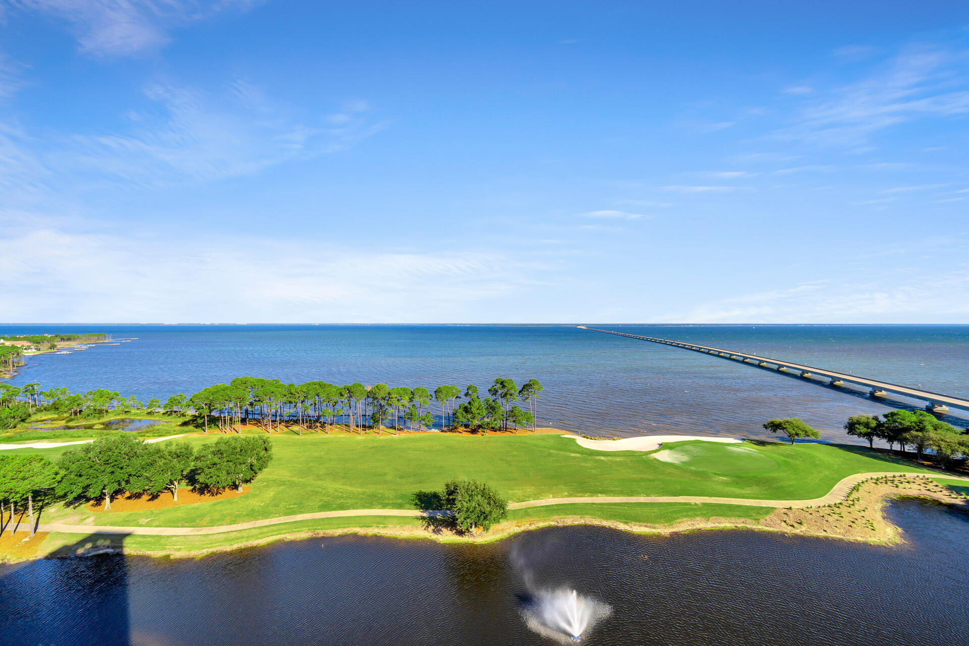 a view of a lake with a big yard