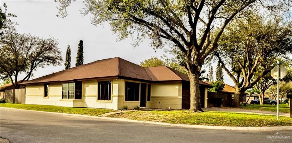 a house with trees in the background