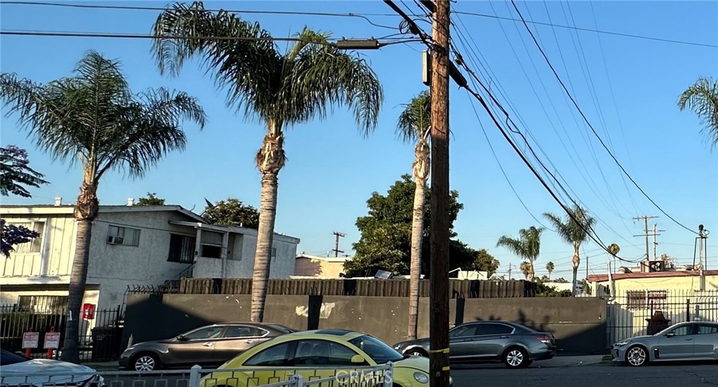 a view of a street with cars