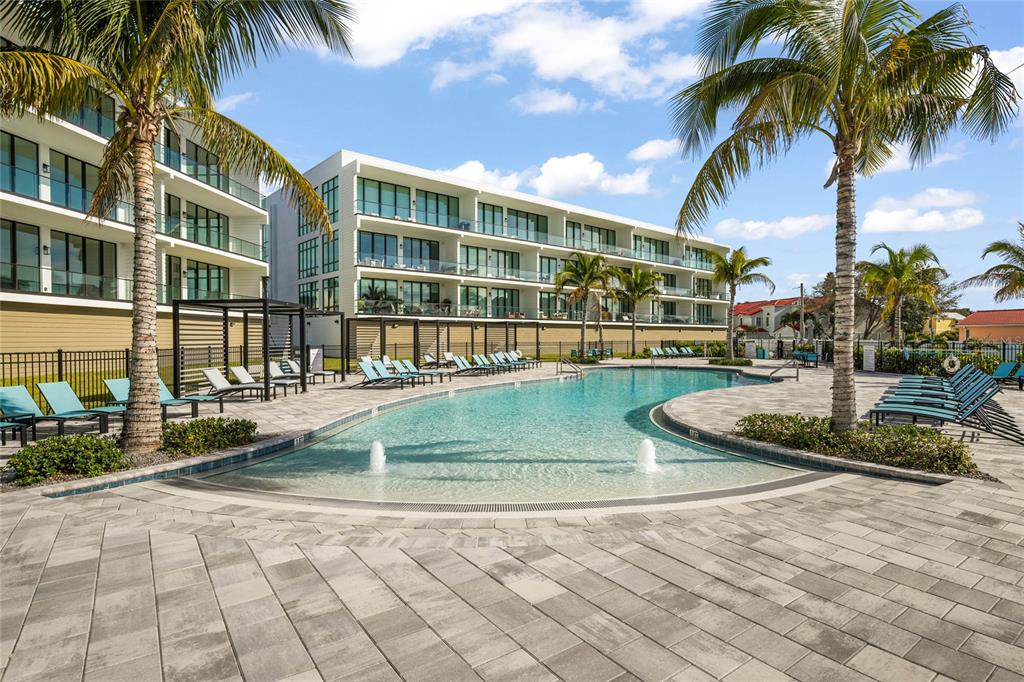 a view of a swimming pool with a patio