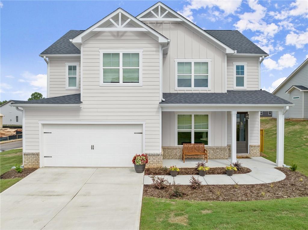 a front view of a house with a porch