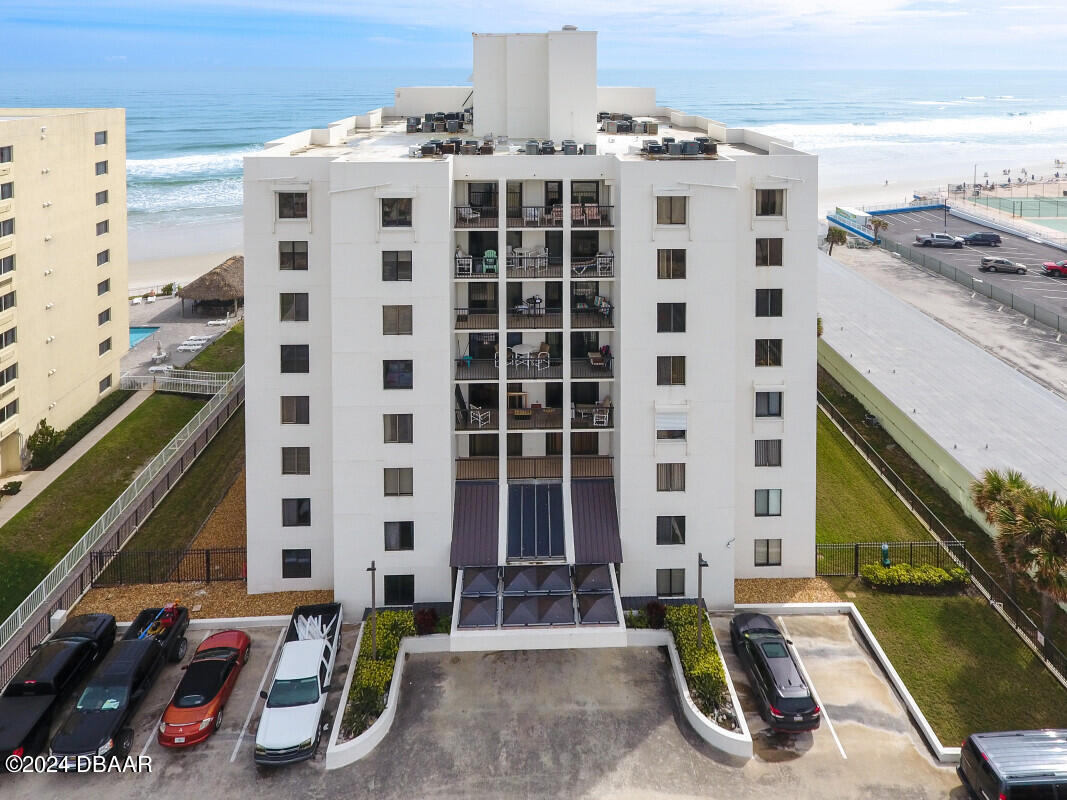 a front view of a building with glass windows