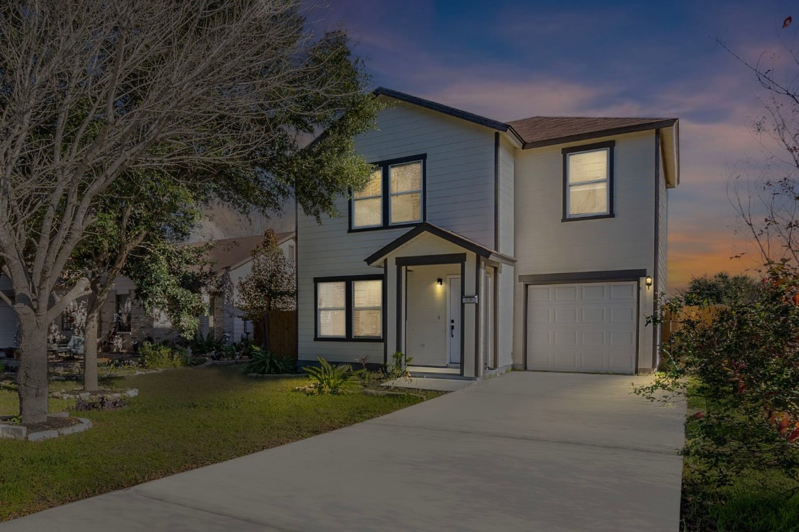 front view of a house with a yard