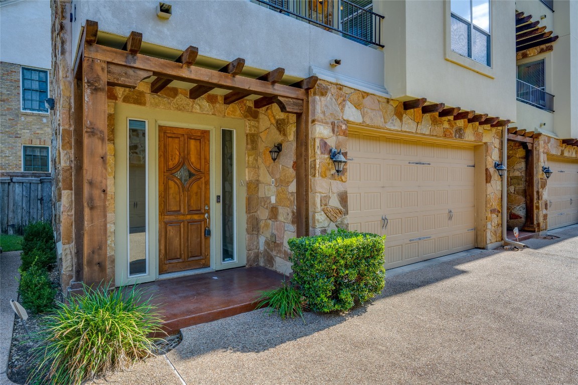 a view of a house with a small yard