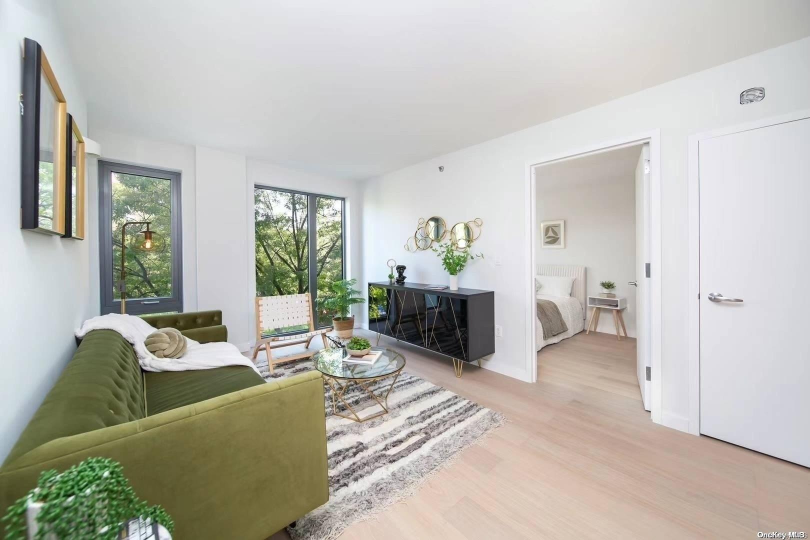 a living room with furniture and a bed